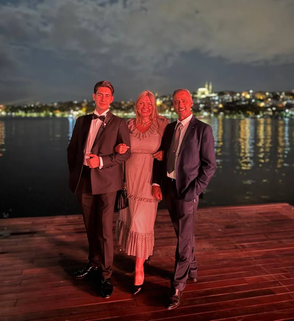 Ateris team at an evening event by the water